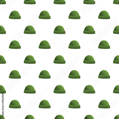 Repeating green beanie hats forming a seamless pattern on a white background
