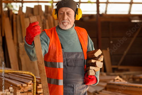 Mature male carpenter with ...