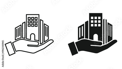 Hand holding black and white building outline and solid