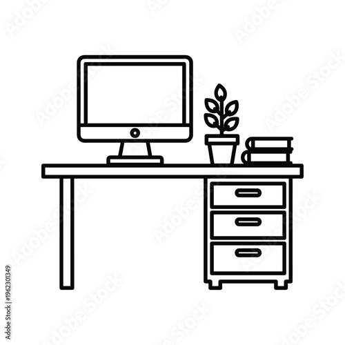 A minimalist workspace with a desk, computer, and filing cabinet