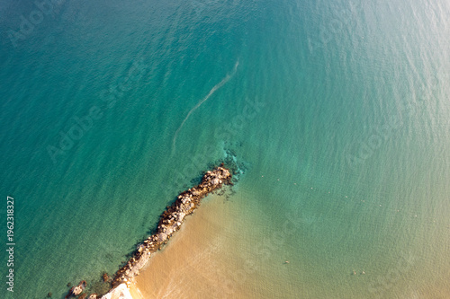 Drone footage of the coastline and sea in Kızkalesi.