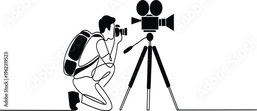 Black and white of a person using a laptop with a giant magnifying glass