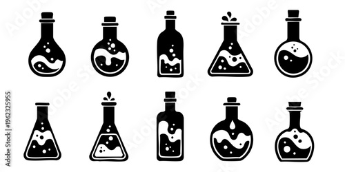 Several laboratory flasks and beakers containing liquids are arranged on a table.