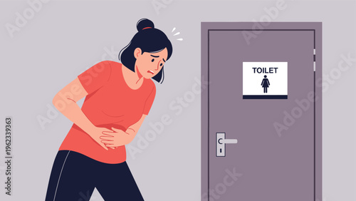 Young woman clutching her stomach in discomfort and looking distressed while standing in front of a public toilet door.