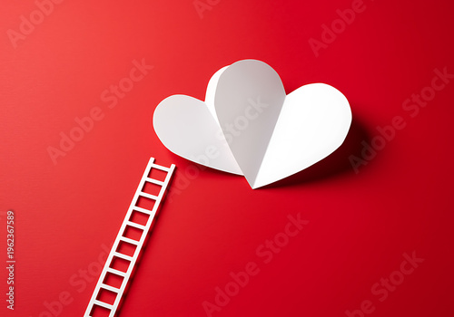 White heart shape cut out and ladder on red background