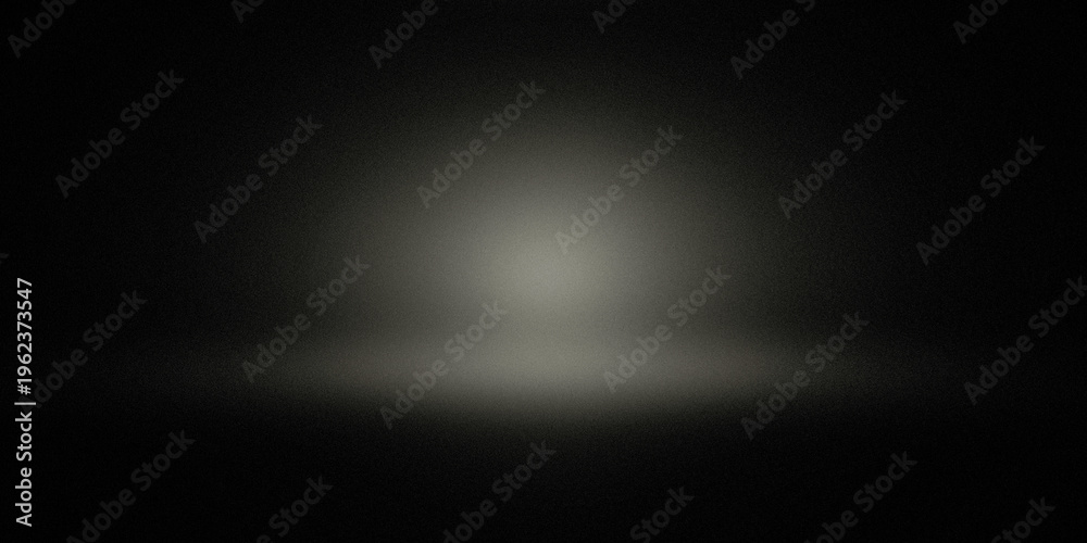 Obraz premium A bright light shining in the darkness of a black background