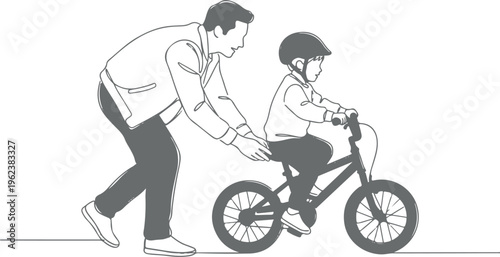 An adult is helping a young child learn to ride a bike by pushing the back of the bicycle on a flat surface
