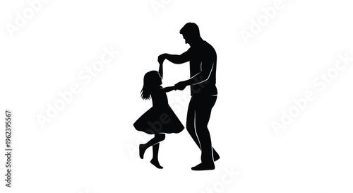 Silhouette of a man and little girl dancing together in a tender moment