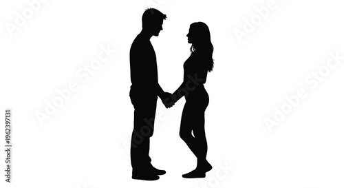 Silhouette of a romantic couple holding hands in love