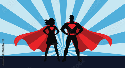 Superhero silhouette couple standing strong in front of radiant blue sunburst background with flowing red capes