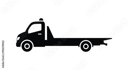 Silhouette of a flatbed tow truck vehicle on a white background