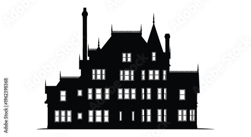 Silhouette of a large gothic style mansion with multiple spires and turrets silhouette
