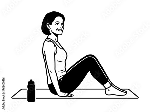 Woman completing home workout on yoga mat