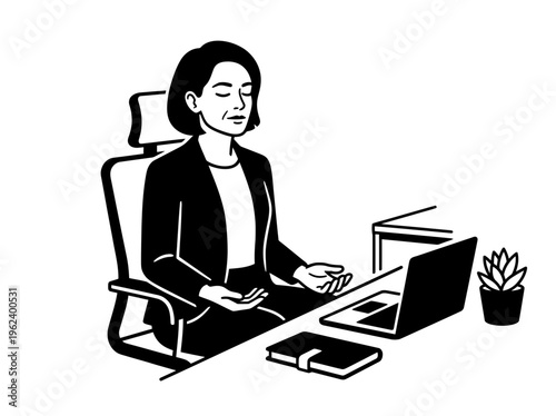 Woman practicing mindful breathing at office desk