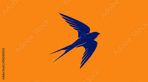 Elegant blue swallow bird soaring against a vibrant orange background.