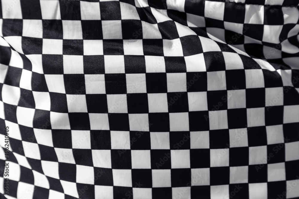 Obraz premium Checkered flag. Finish flag. Fabric with a texture of black and white squares