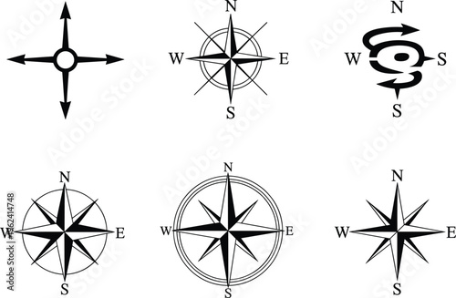Black compass rose with directional arrows and circular patterns on white background north south east