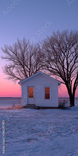 Charming white house against a twilight sky