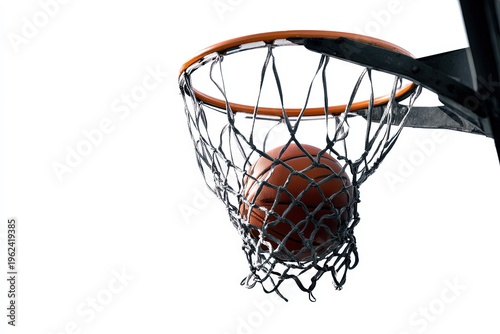 A basketball swishes through the net, capturing the precise moment of a perfect shot.