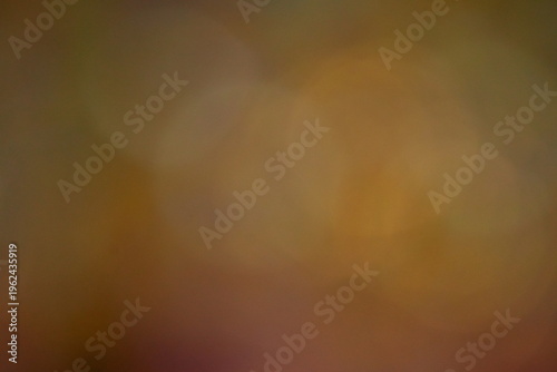 Warm Golden Bokeh Lights Background with Soft Orange Glow