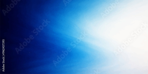 Beautiful abstract blue background of a clear summer sky with fluffy white clouds and bright sunlight creates a peaceful nature cloudscape