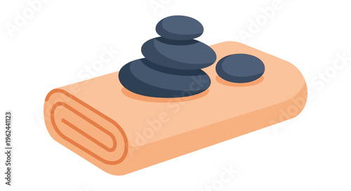Rolled up orange towel with stacked black hot stones in minimalist zen spa setting for wellness