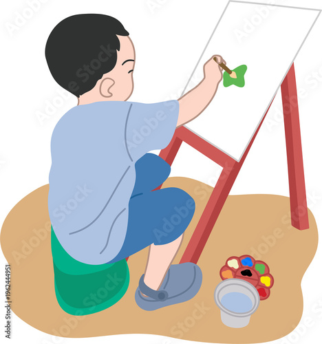 kid painting on canvas