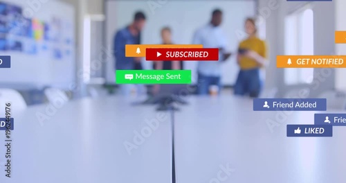 Vertical video: Badges appearing across white table while team of four checking devices in meeting