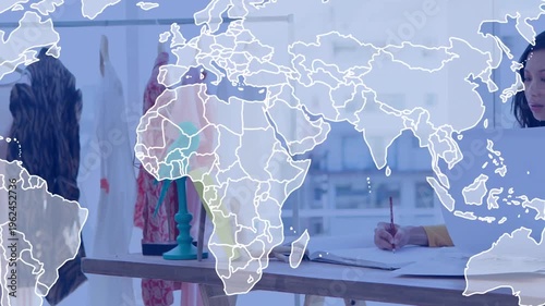 Writing designer sketching at worktable, wearing yellow top, measuring tape, red pencil, copy space