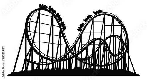 Silhouette of a roller coaster with hills and tracks in a theme park