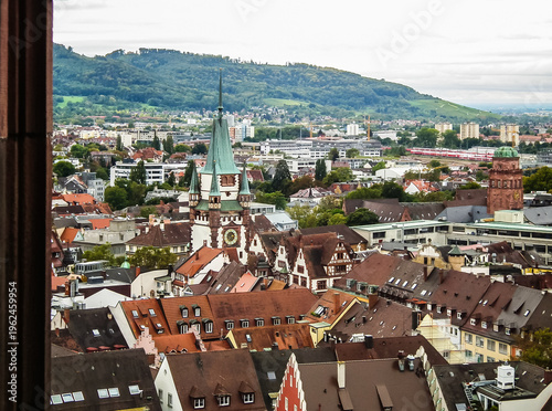 View from roof of Freiburg Munster to the adjacent historical part of Freiburg im Breisgau city in Germany
