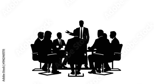 Silhouette of business team in a meeting with a presenter standing