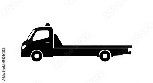 Silhouette of a flatbed tow truck vehicle in black
