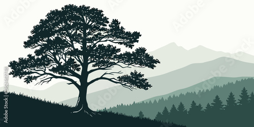 A large tree on a hill with mountains in the background