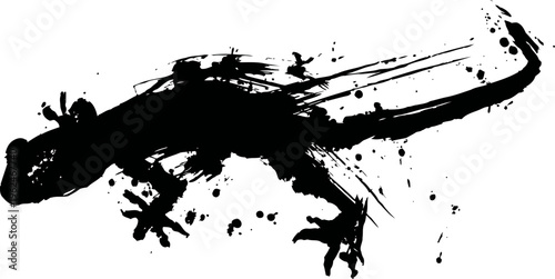 black ink lizard silhouette with splashes and strokes on white background