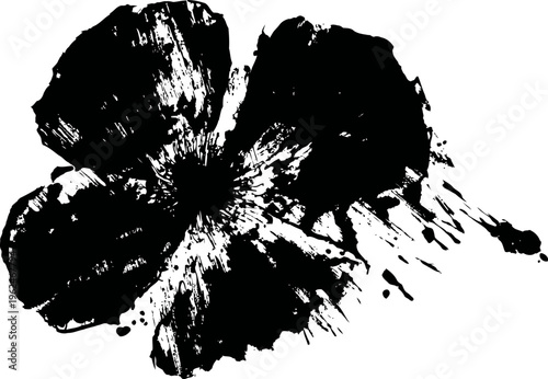 Black ink splatter paint blot with abstract floral shape and dynamic splash design