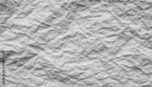 Halftone crumpled paper texture with dotted, rough, and wrinkled surface. Black creased sheet background in comic pop-art style, featuring grainy folds and distressed vintage details.