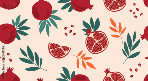 Seamless pattern featuring whole and sliced pomegranates, seeds, and green leaves on a soft beige background for fabric design.
