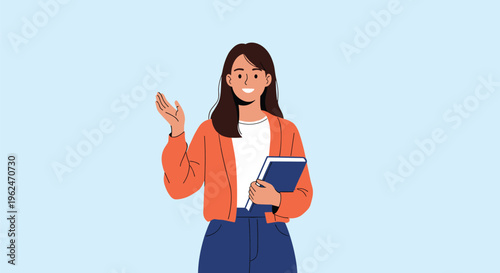 Smiling young woman in a bright orange cardigan holding a blue book and waving towards the camera against a simple light blue background.
