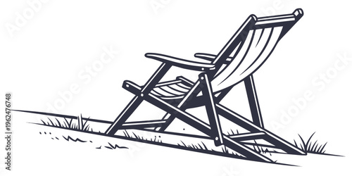 A wooden deck chair with a striped cushion sits on a grassy lawn.