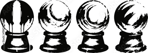 Four glass crystal balls on stands with smoky swirls and fire pattern close up