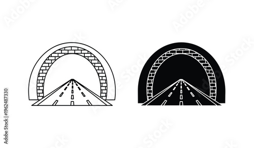 Silhouette of two brick archways with road leading to a vanishing point