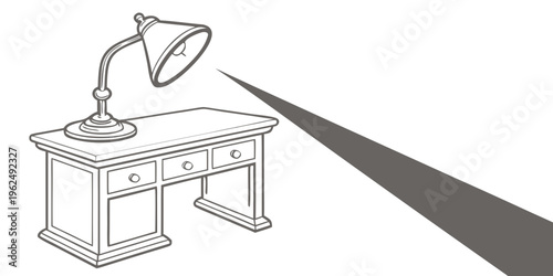 A well-organized study desk with a lamp and a computer monitor.