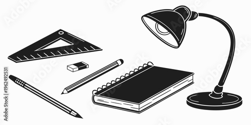A collection of office supplies including a lamp, a notebook, and drawing tools