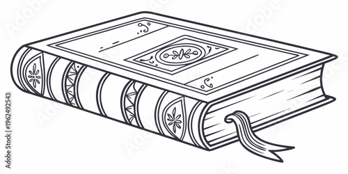 An ancient book with intricate designs on its cover and spine, resting on a flat surface.