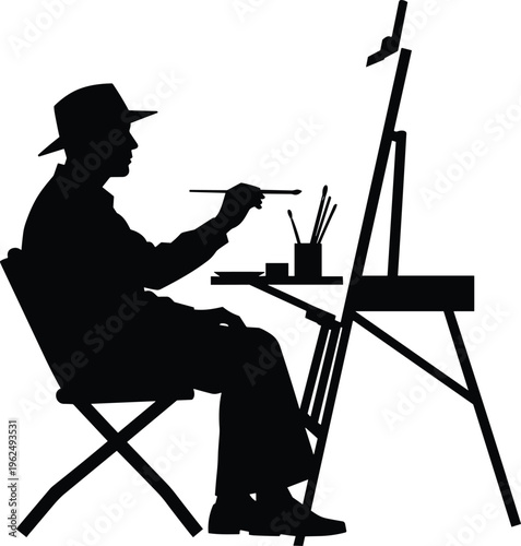 Black silhouette of a man sitting on a chair painting on an easel artist painter