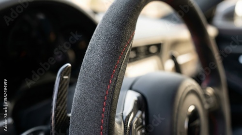 Close Up of Alcantara Steering Wheel in Luxury Vehicle