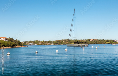 Wallpaper Mural Sailing boat in the waters of the Mediterranean Sea in Porto Cervo marina, Costa Smeralda, in the municipality of Arzachena, Sardinia, Italy.  Torontodigital.ca