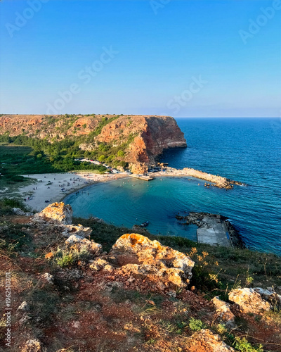 Картината върху платно scenic coastal landscape of bali bay with rocky cliffs, calm turquoise water and