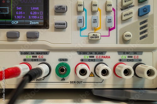 Fotografie Close-up of electronic power supply controls and connections